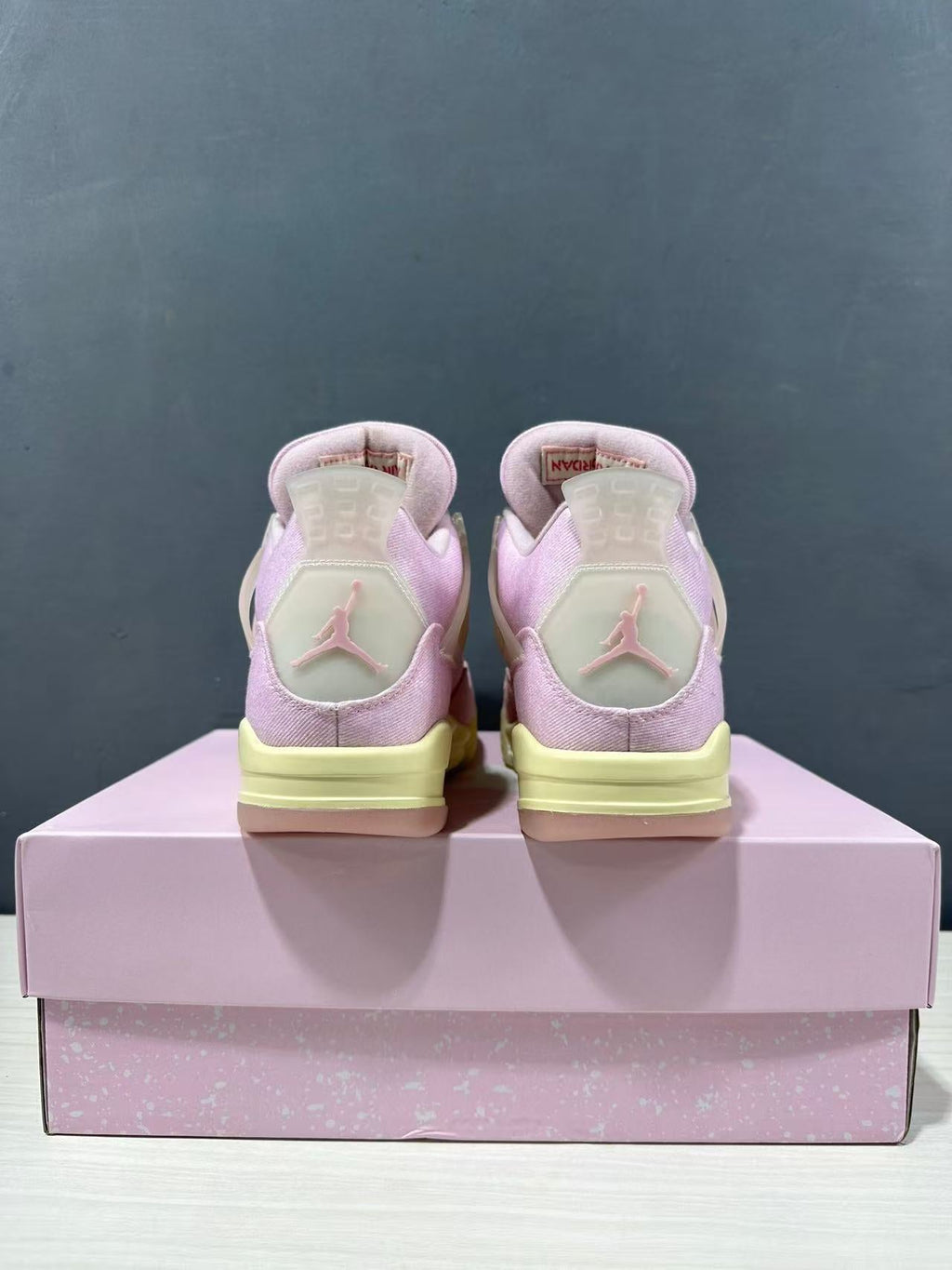 Air Jordan 4 Retro Pink Sneakers IB6716-600 - product image from the listing.