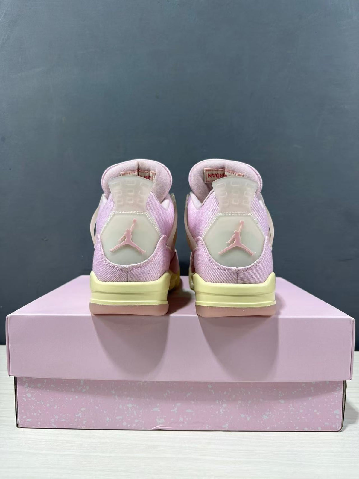 Air Jordan 4 Retro Pink Sneakers IB6716-600 - product image from the listing.