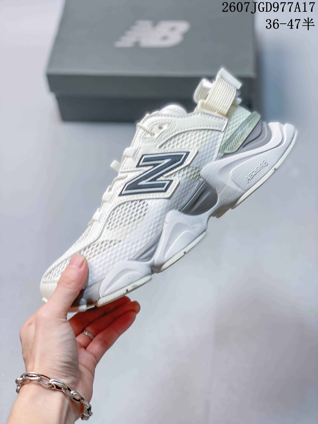 New Balance 9060 Mule Sneakers in White Navy - product image from the listing.