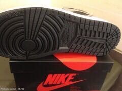 Jordan 1 High Sneakers in Grey Black - product image from the listing.