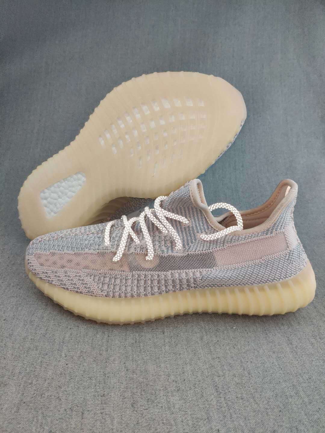Gray and Cream Yeezy 350 V2 Knit Sneakers - product image from the listing.