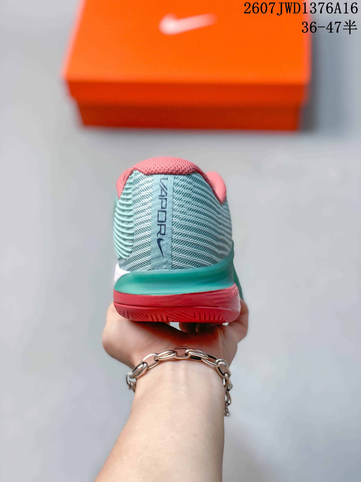 Mint Green and Coral Nike Vapor 12 Low-Top Tennis Sneakers - product image from the listing.