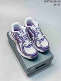 New Balance 740 Sneakers in White and Purple - product image from the listing.