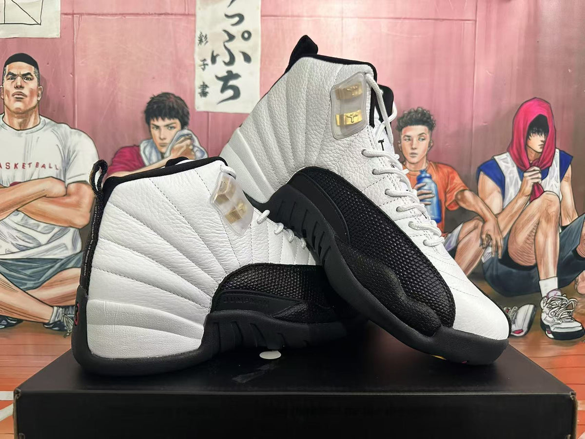 Jordan 12 Taxi Sneakers in White and Black - product image from the listing.