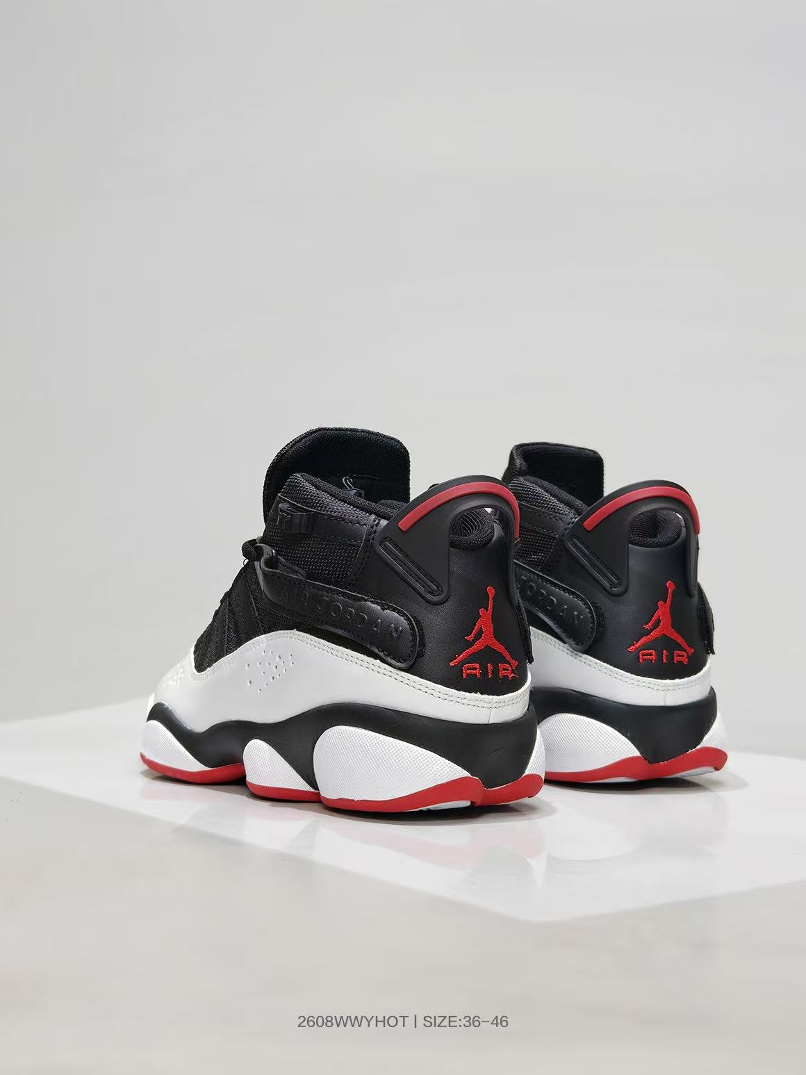 Jordan 6-12 Sneakers in Black White Red - product image from the listing.