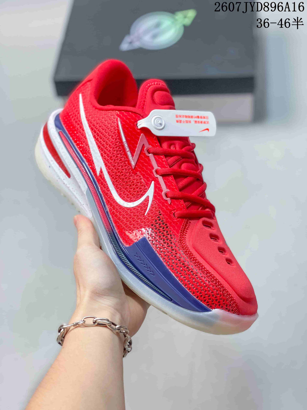 Nike Air Zoom G.T. Cut EP Basketball Shoes in Red White Blue - product image from the listing.