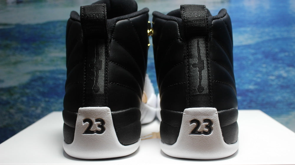 Air Jordan 12 Wings Black White Gold Sneakers 848692-033 - product image from the listing.