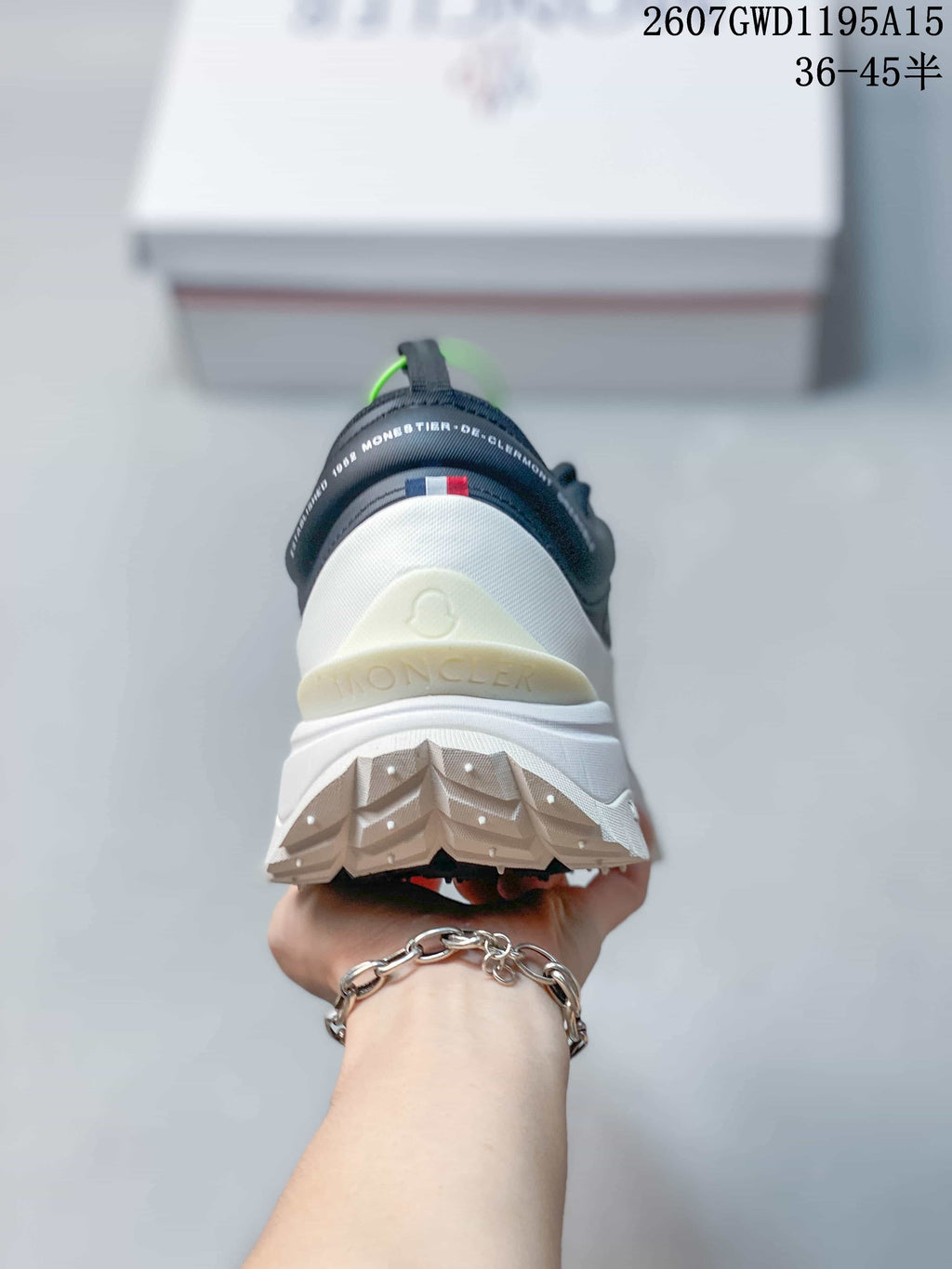 Moncler Trailgrip Lite2 Sneakers in White Black 2607GWD1195A15 - product image from the listing.