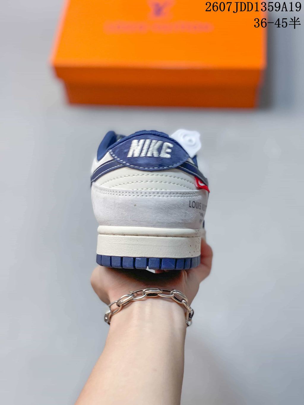 Air Jordan 1 Low Sneakers White and Navy - product image from the listing.