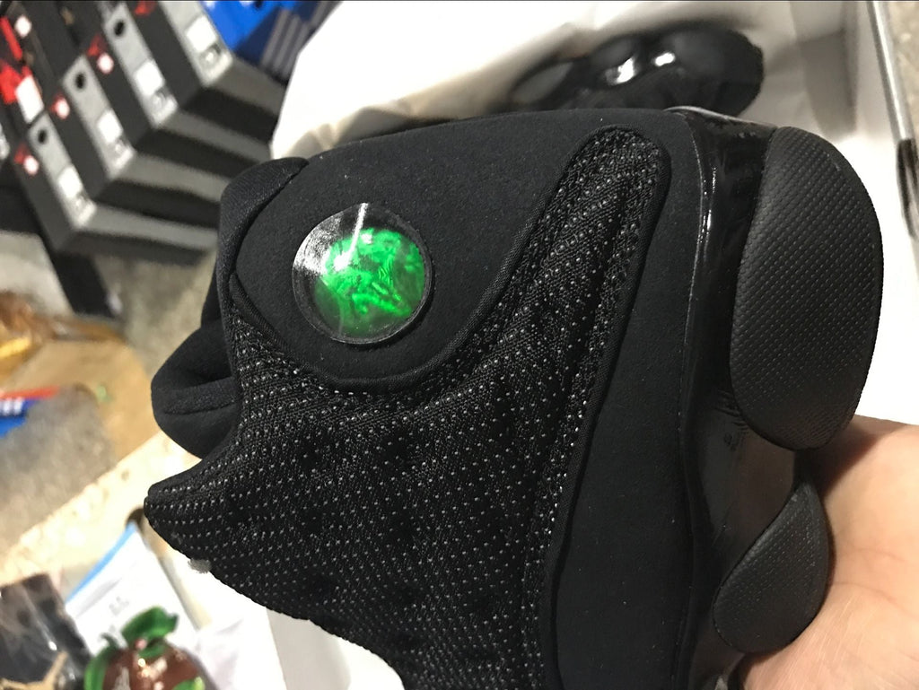 Air Jordan 13 Retro Black Cat Basketball Sneakers in Black - product image from the listing.