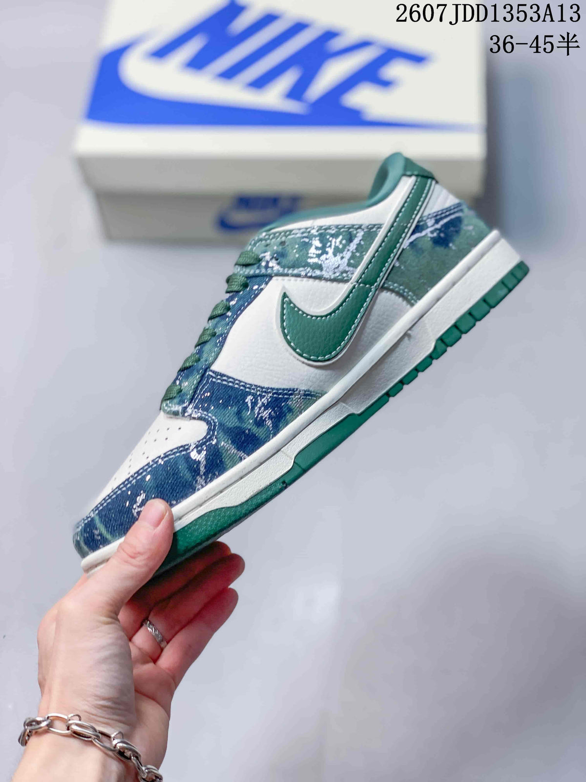 Nike SB Dunk Low in Blue Green White JDD1353A13 - product image from the listing.