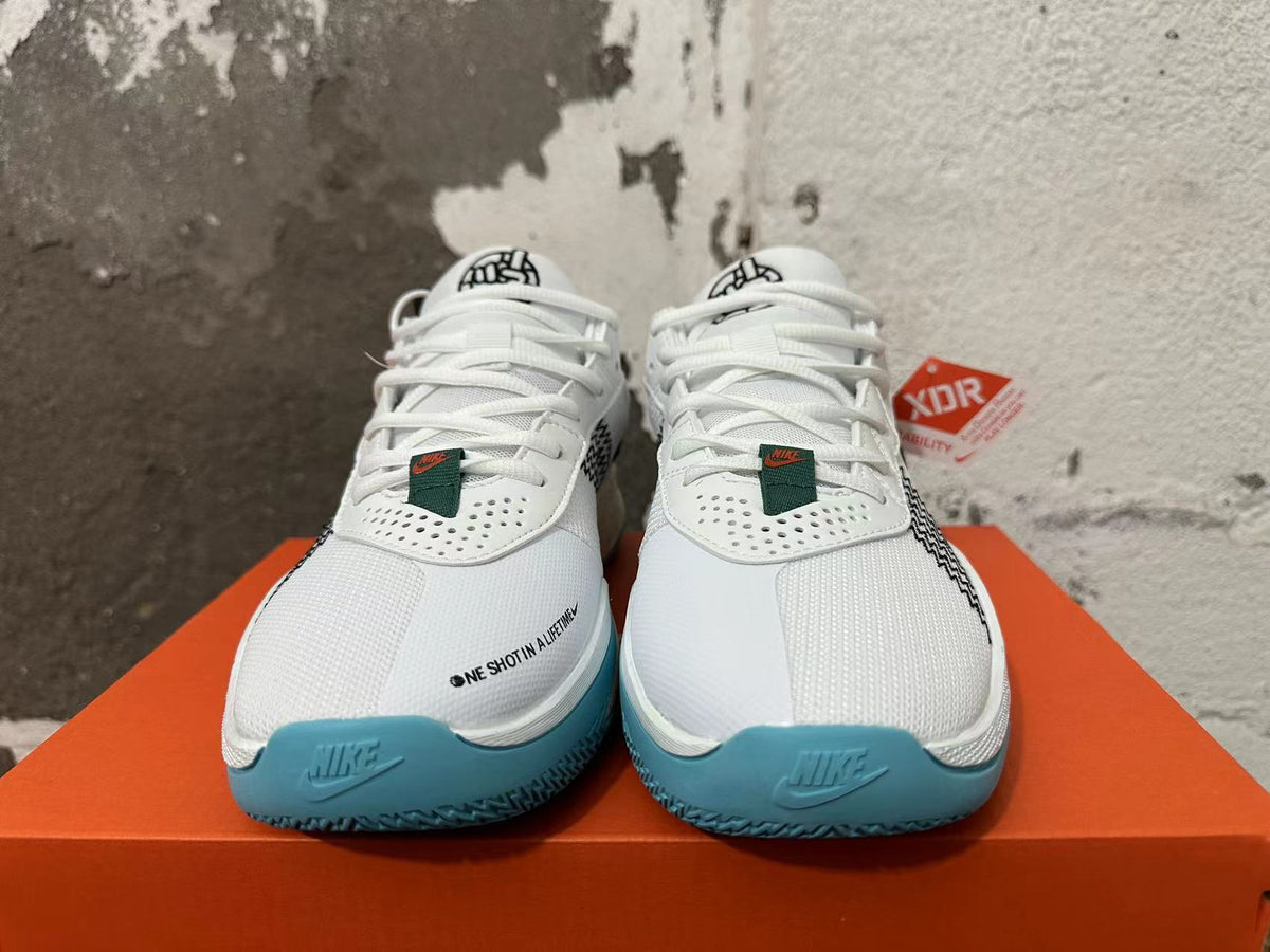 Nike G.T. Cut Academy Basketball Shoes, in White and Green - product image from the listing.