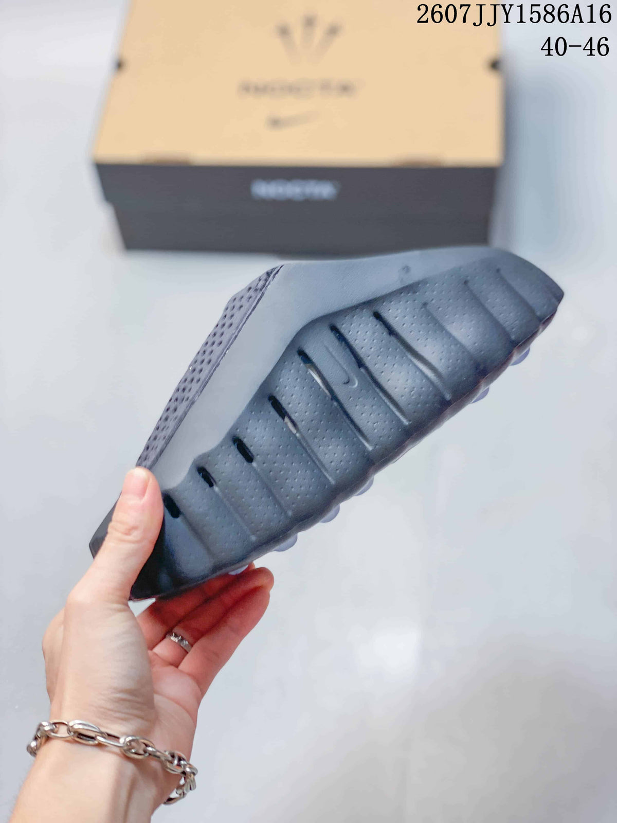 Black Nike Mind 001 Closed-Toe Slides - product image from the listing.