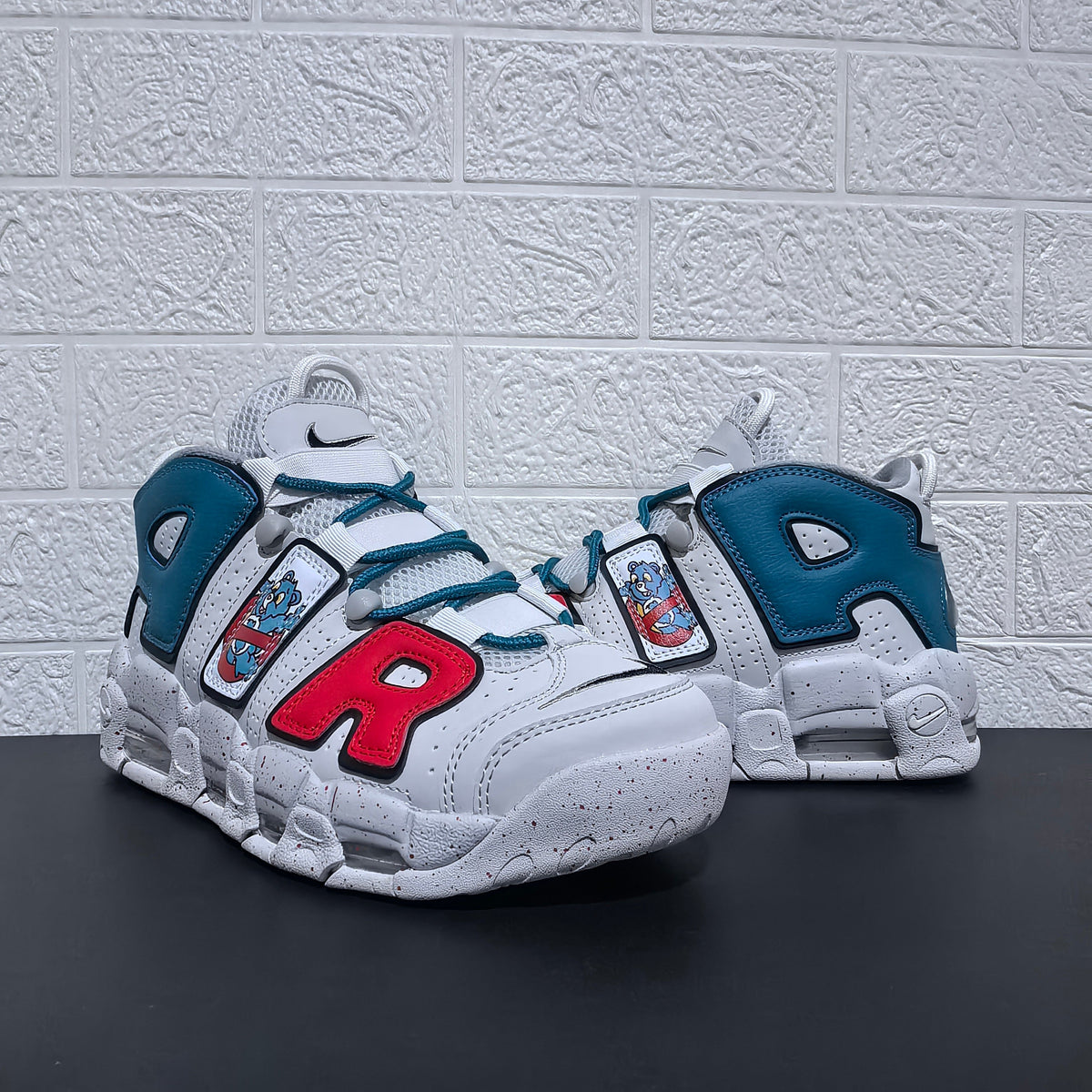 Nike Air More Uptempo Cartoon Bear Sneakers, in White Blue Red - product image from the listing.