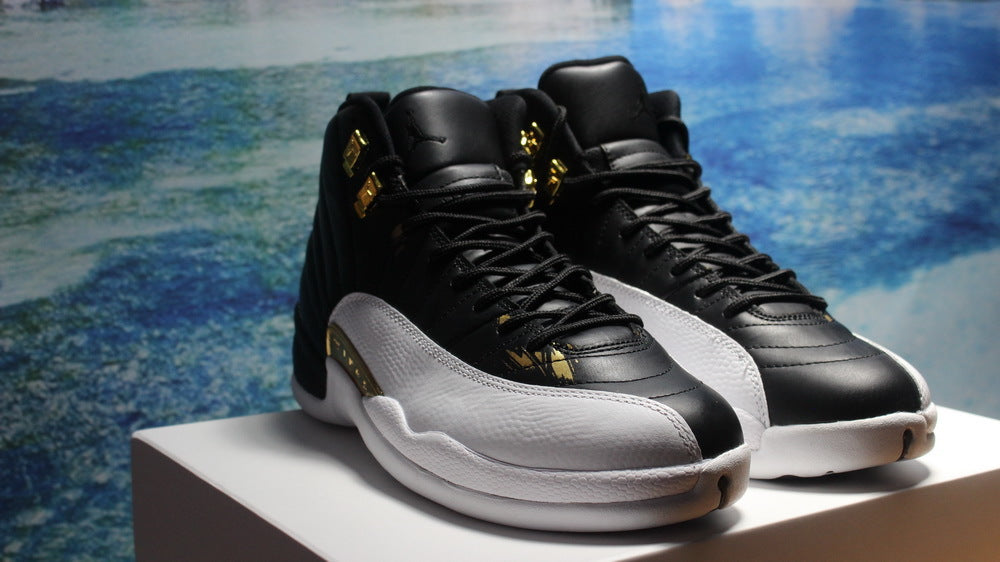 Air Jordan 12 Wings Black White Gold Sneakers 848692-033 - product image from the listing.