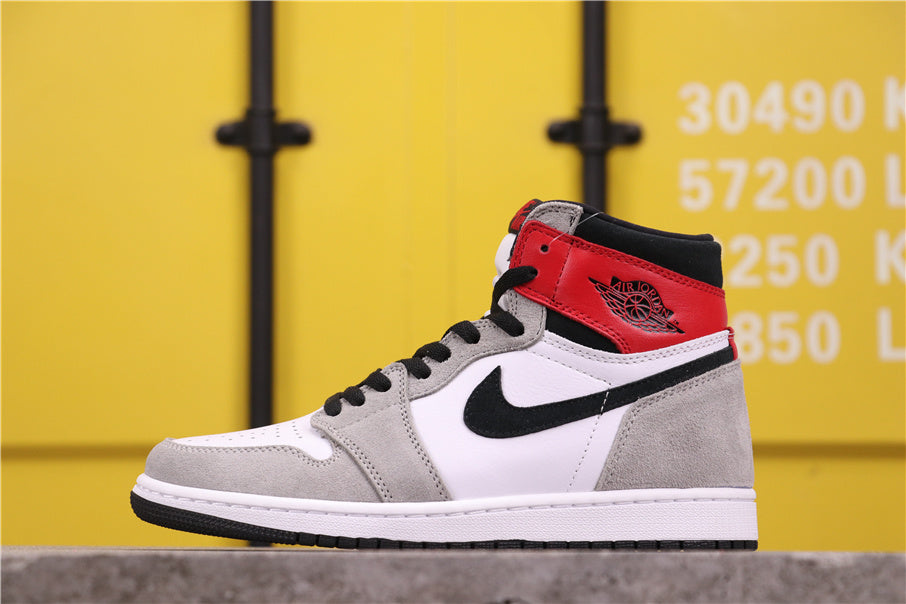 Air Jordan 1 High Sneakers in Light Smoke Grey 555088-126 - product image from the listing.