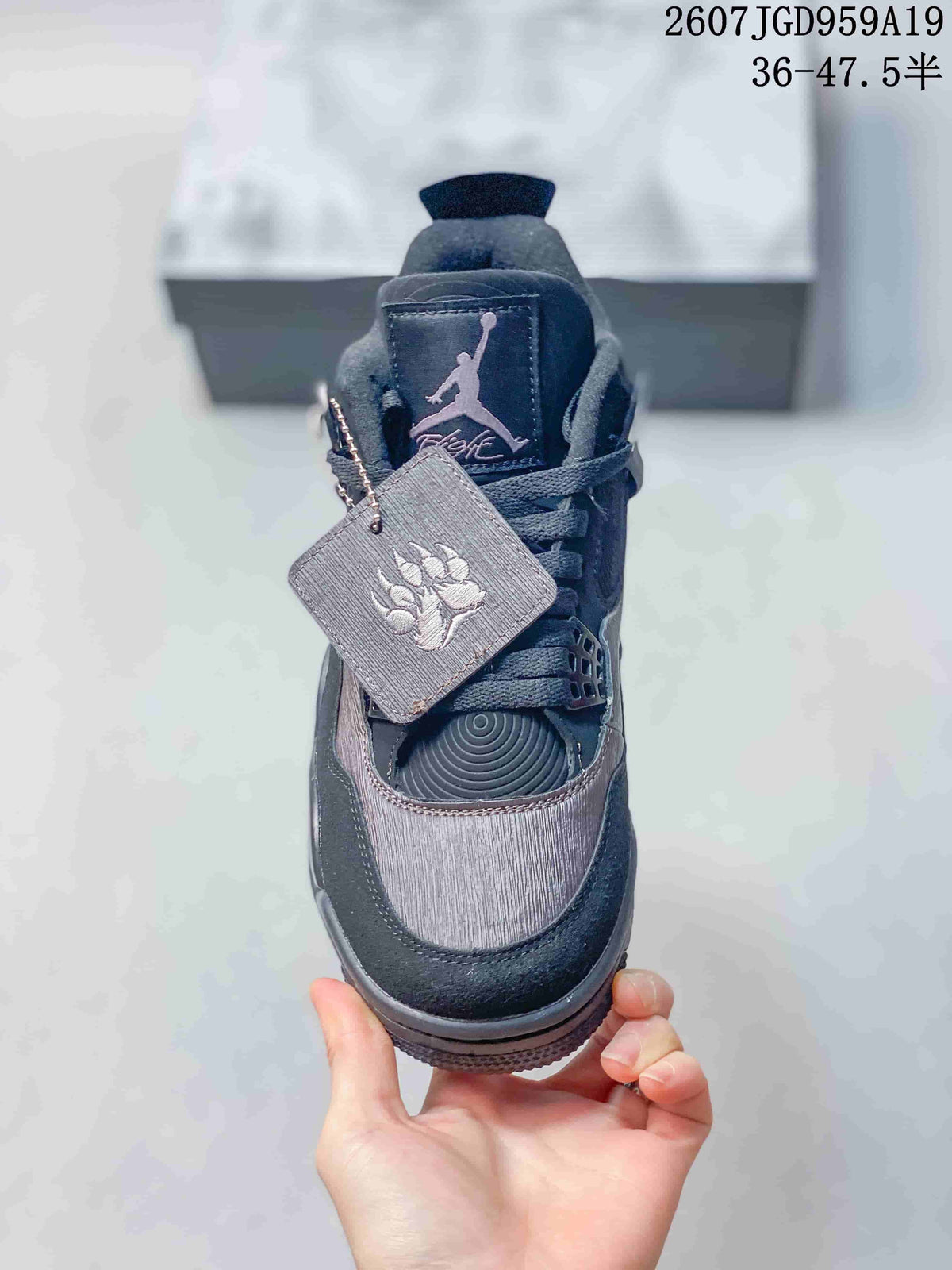 Air Jordan 4 Retro Dark Gray Sneakers JA8136 - product image from the listing.