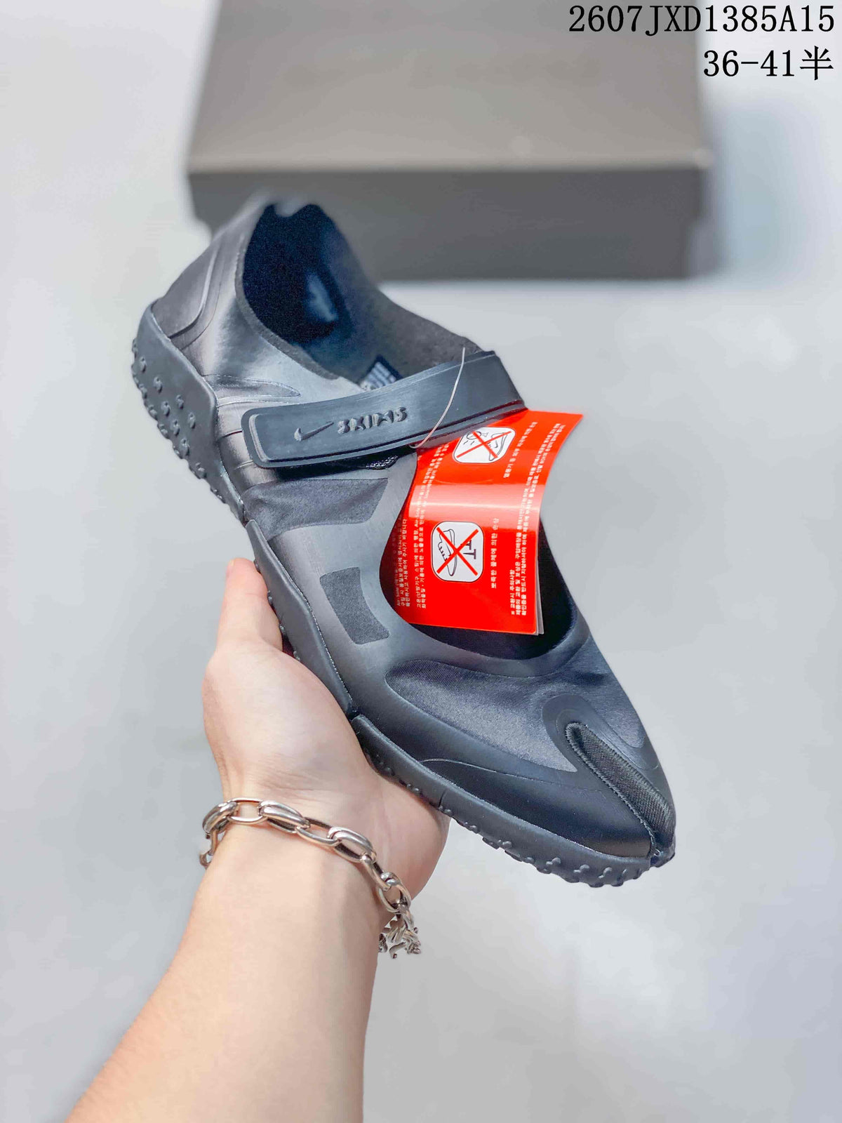 Nike x SKIMS Air Rift Mesh Split-Toe Shoes in Black - product image from the listing.
