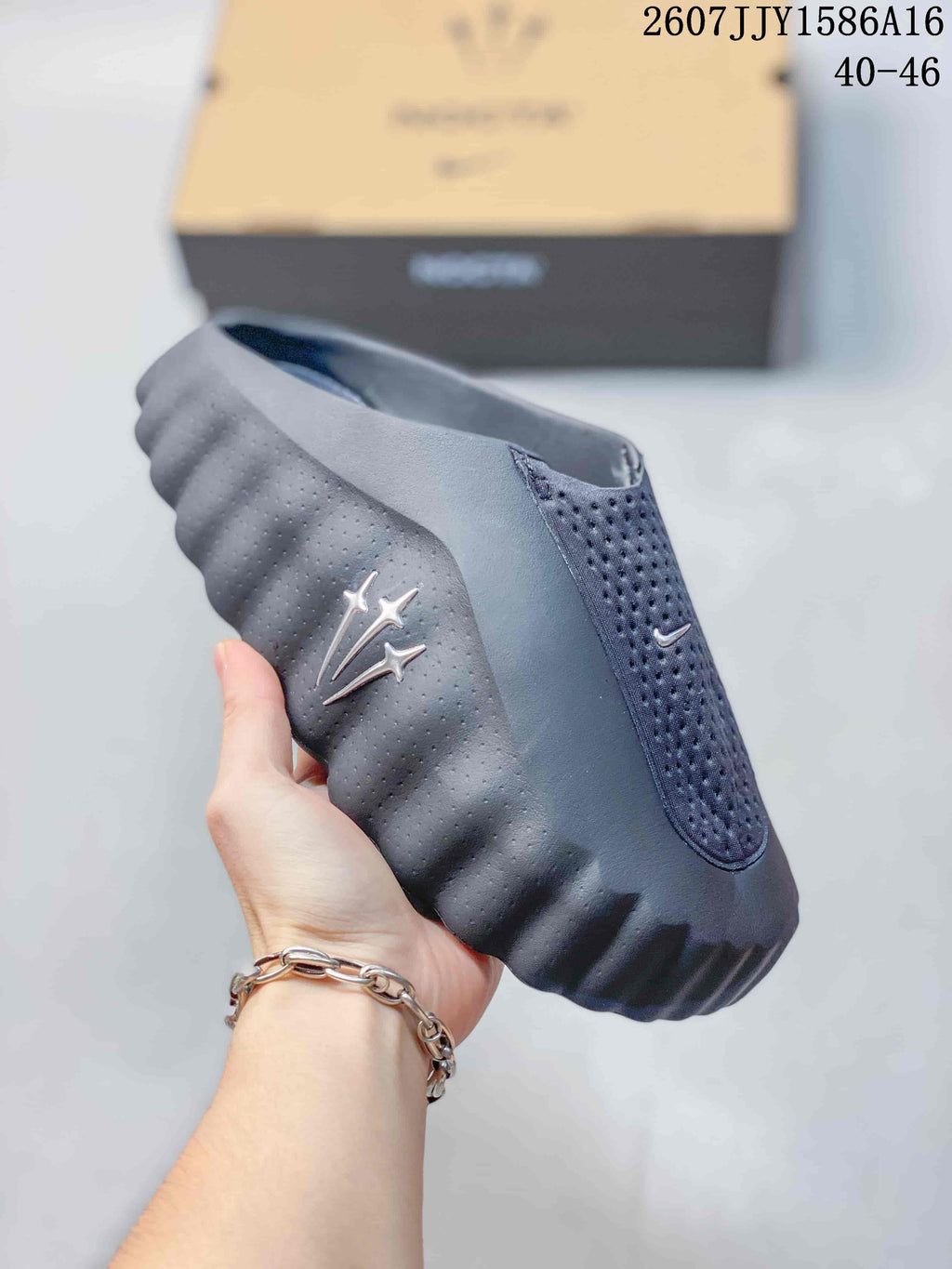 Black Nike Mind 001 Closed-Toe Slides - product image from the listing.