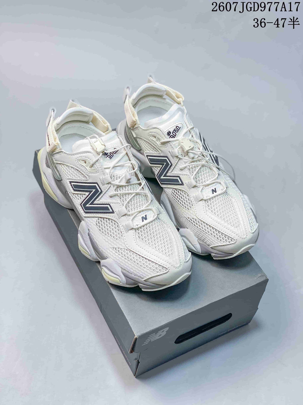 New Balance 9060 Mule Sneakers in White Navy - product image from the listing.