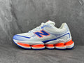 New Balance Running Sneakers in Blue and Orange - product image from the listing.