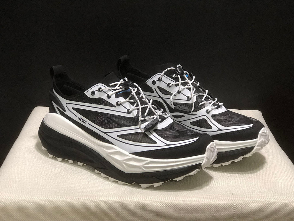 HOKA Stinson One 7 Black and White Trail Trainers - product image from the listing.