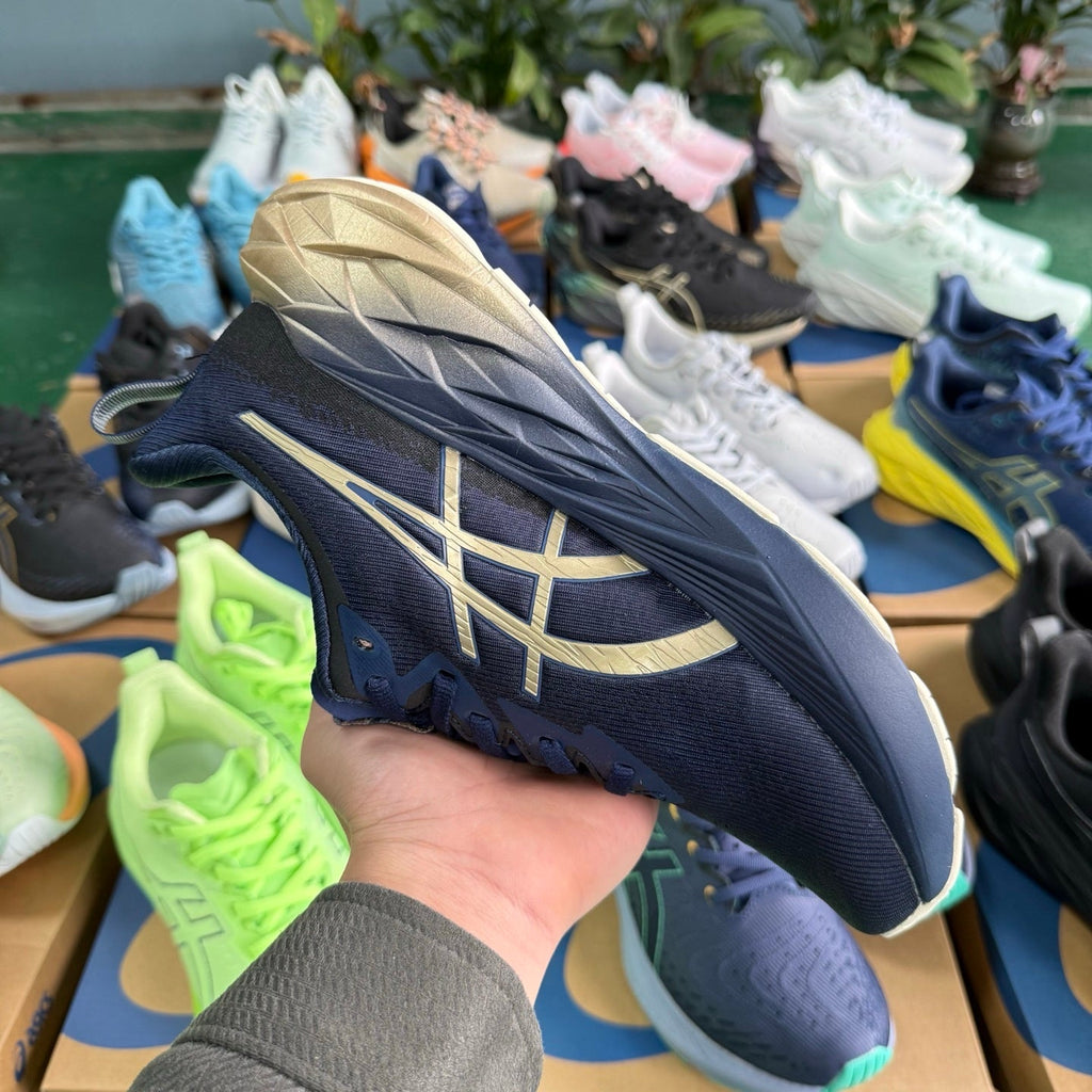 ASICS NOVABLAST 4 Running Shoes, in Blue and Gold - product image from the listing.
