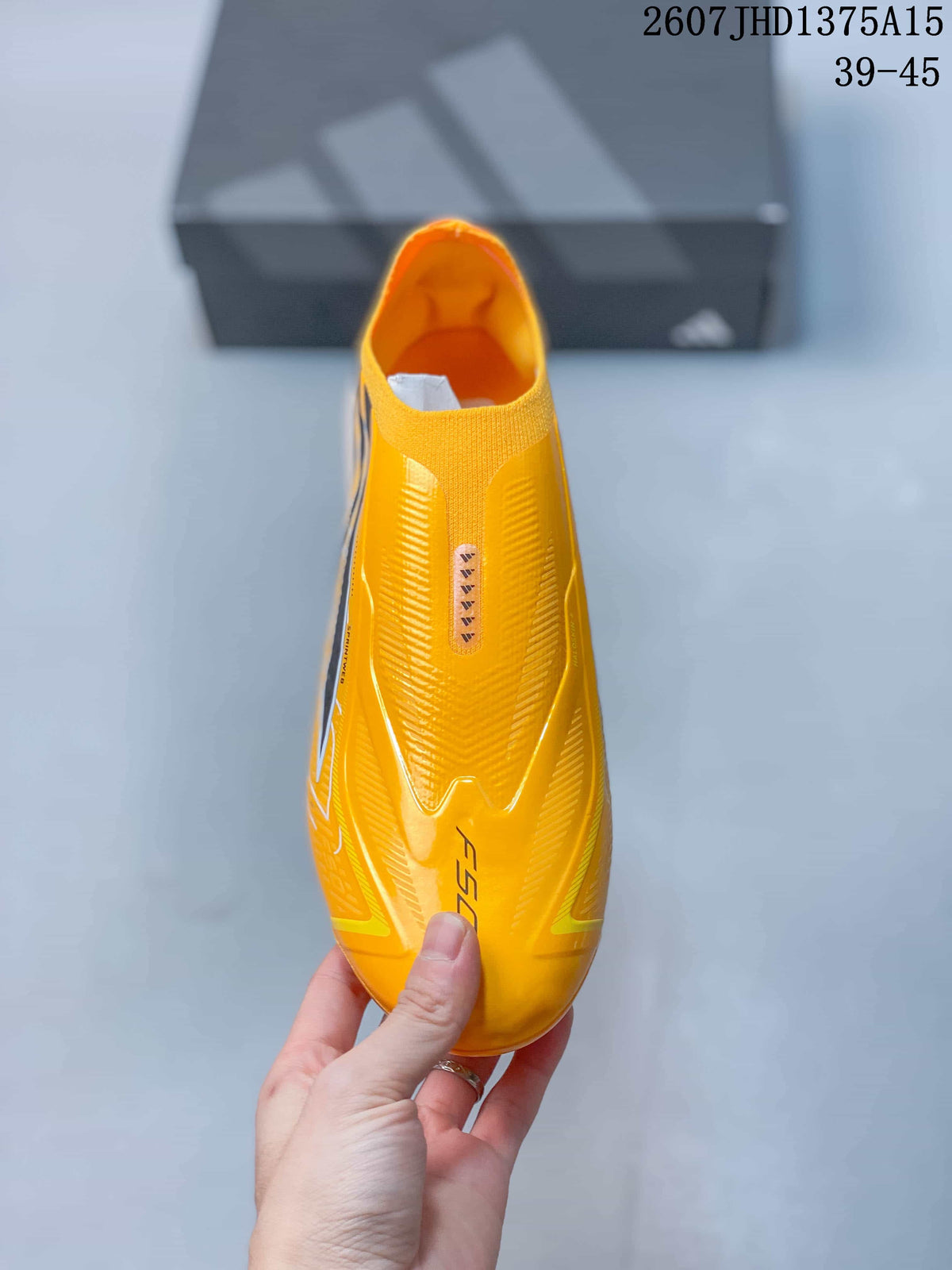 F50 Elite Yellow Black Laceless Soccer Cleats by adidas - product image from the listing.