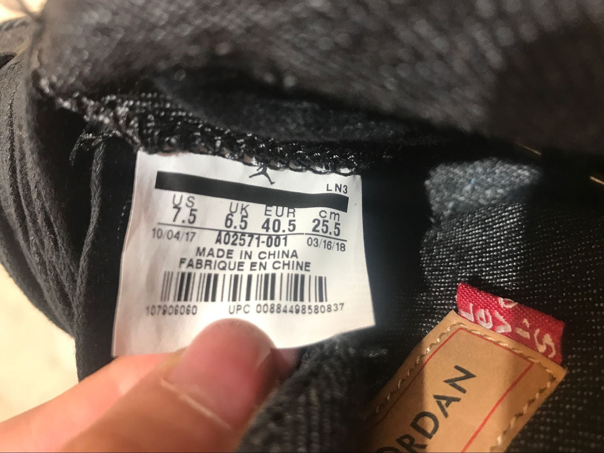 Jordan 4 Retro Levi's Sneakers in Black Denim A02571-001 - product image from the listing.