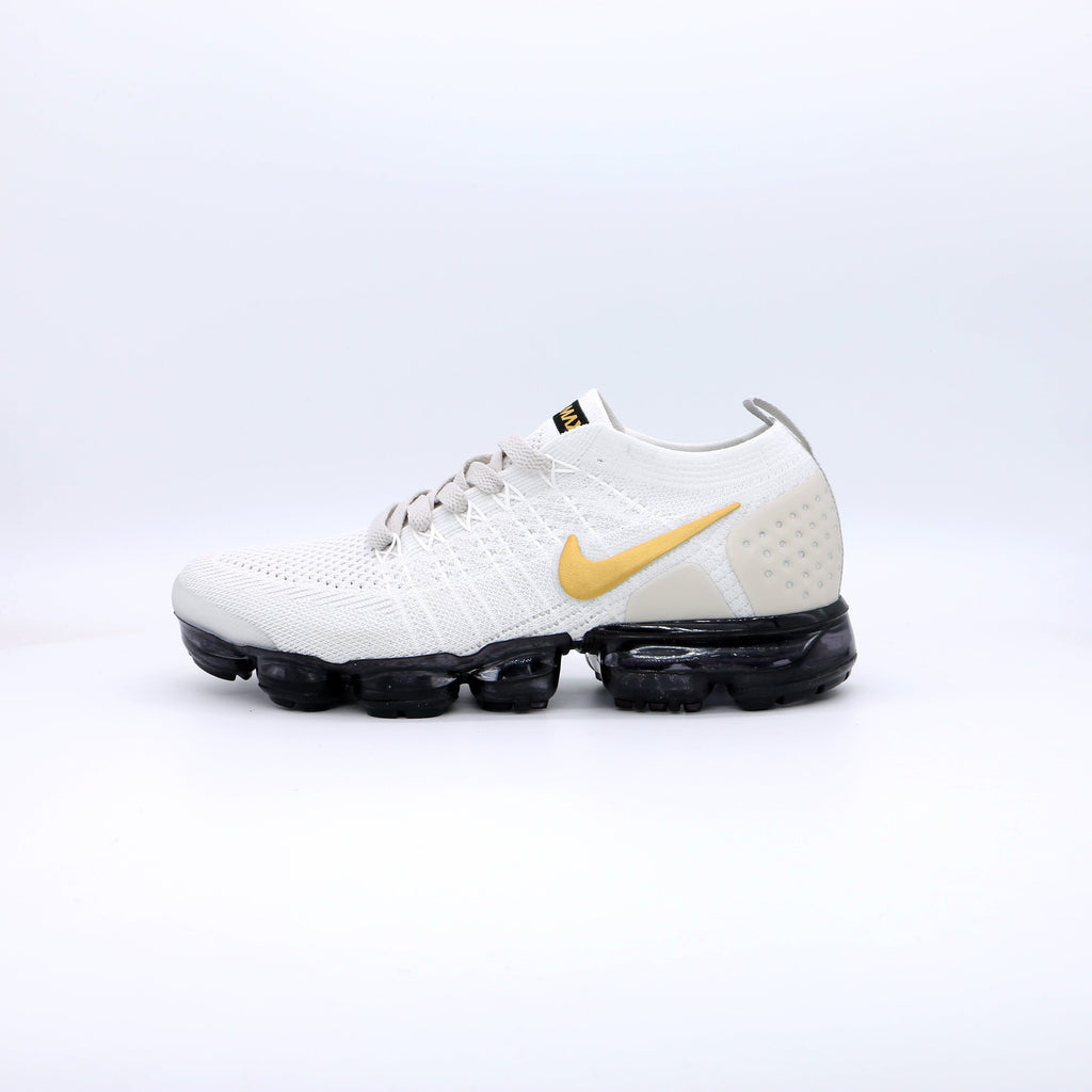 Nike Air VaporMax Flyknit Sneakers in White Gold Black 942842-010 - product image from the listing.