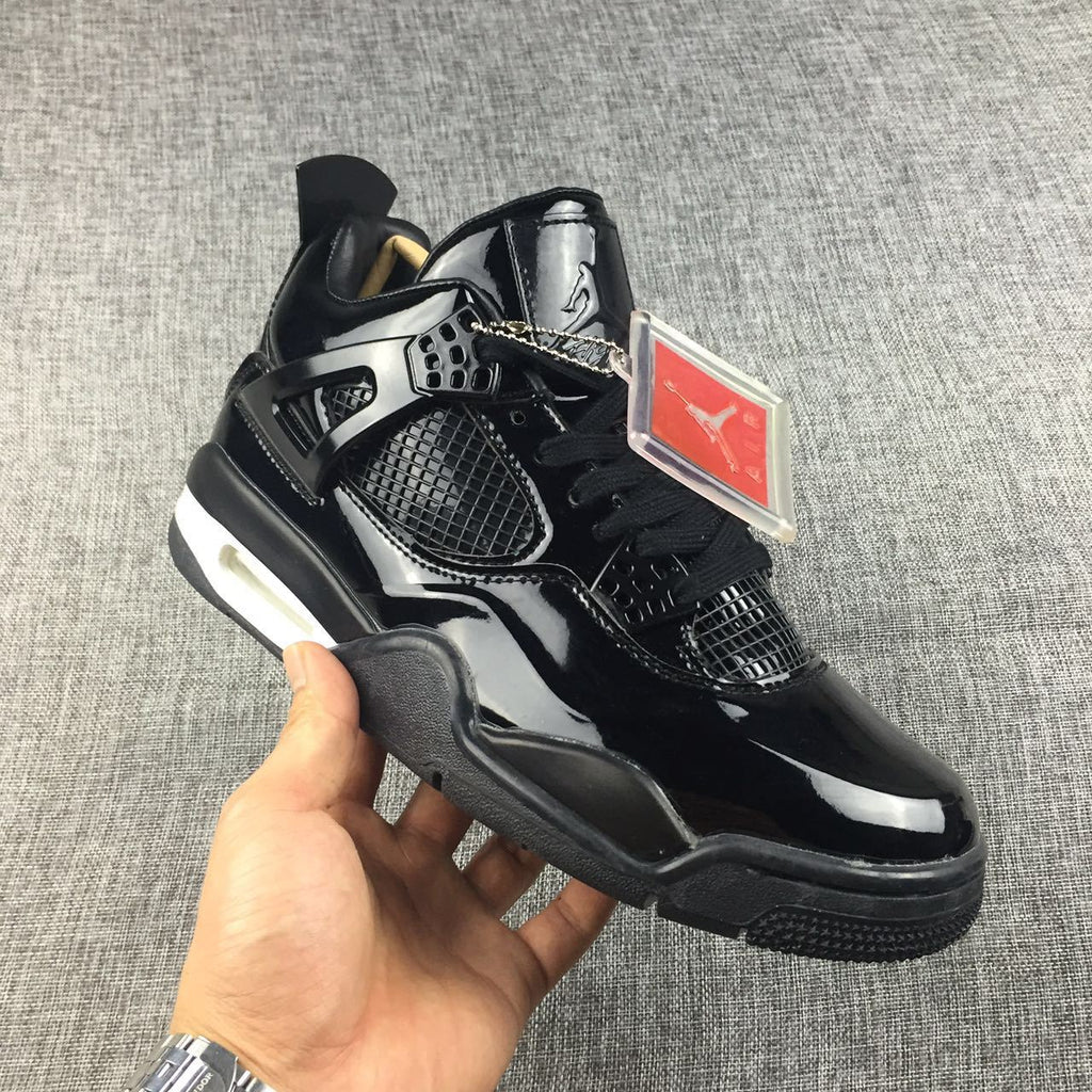 Air Jordan 4 Black Glossy Sneakers - product image from the listing.