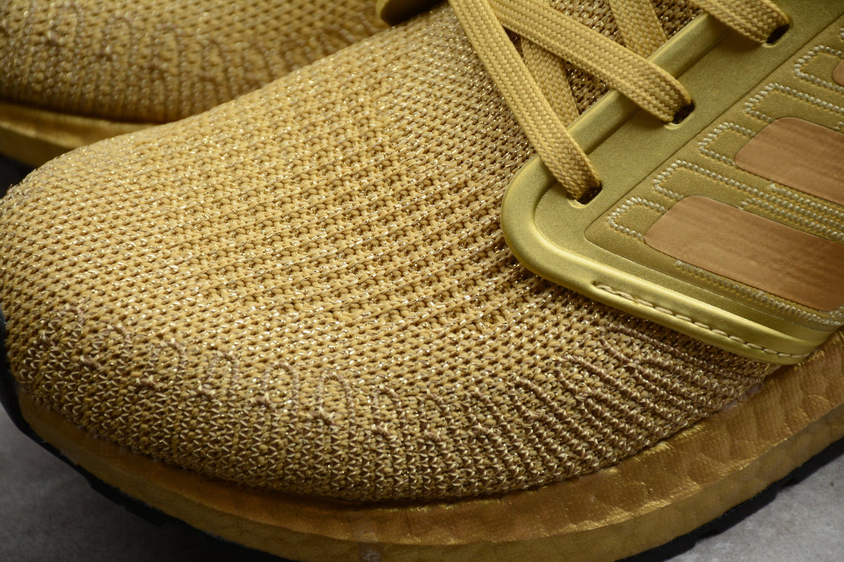 Adidas UltraBOOST 20 Consortium 6.0 Running Shoes in Gold FY3448 - product image from the listing.