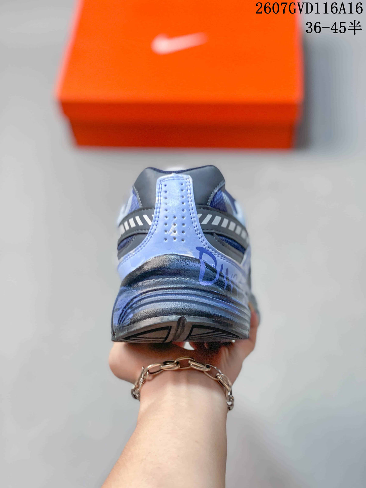 Nike Initiator Casual Sneakers in Blue Gray - product image from the listing.