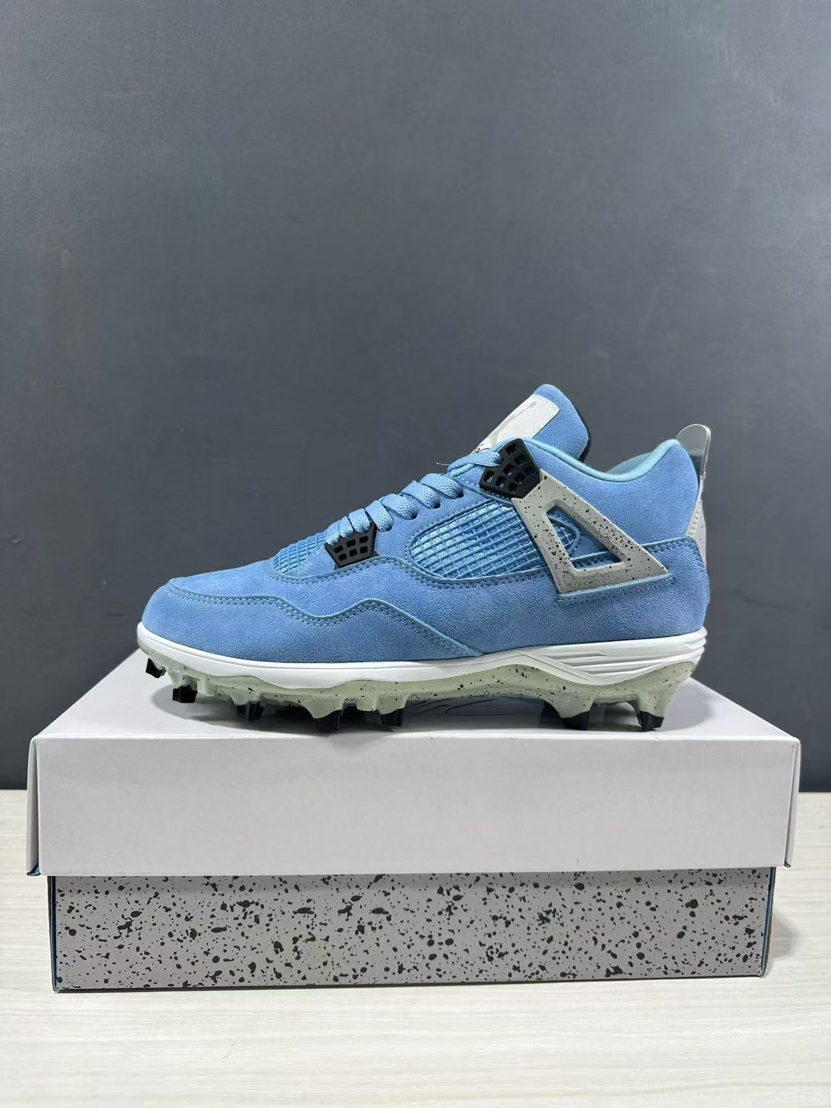 Air Jordan 4 University Blue Cleats CT8572-400 - product image from the listing.