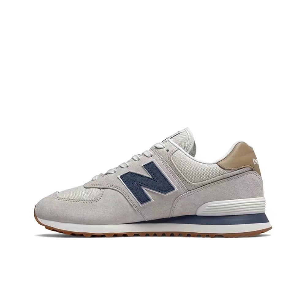 New Balance 574 Lifestyle Sneakers in Grey Navy - product image from the listing.