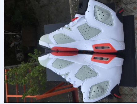 Air Jordan 6 Sneakers in White, in Grey and Red - product image from the listing.