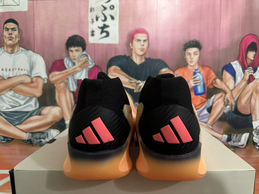 Black and Orange Adidas Basketball Shoes - product image from the listing.