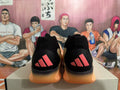 Black and Orange Adidas Basketball Shoes - product image from the listing.
