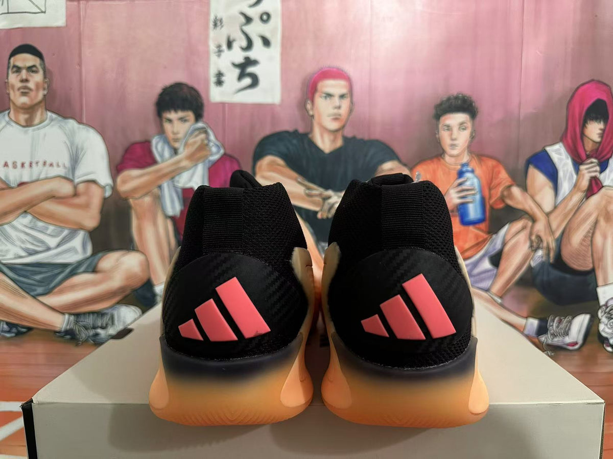 Black and Orange Adidas Basketball Shoes - product image from the listing.