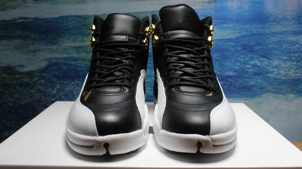 Air Jordan 12 Wings Black White Gold Sneakers 848692-033 - product image from the listing.