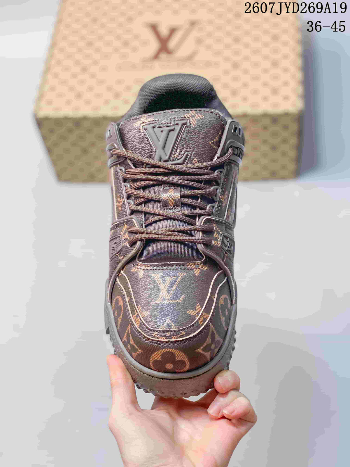 Louis Vuitton Trainer Maxi Low-Top Sneakers in Brown - product image from the listing.