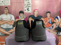 Nike Sneakers in Black and Gray - product image from the listing.