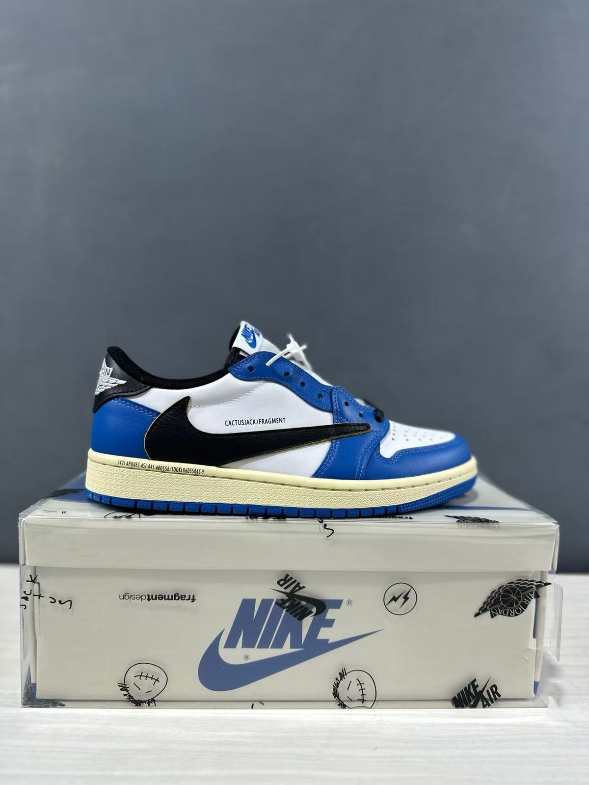 Jordan 1 Low Travis Scott Fragment in Blue White DM7866-141 - product image from the listing.