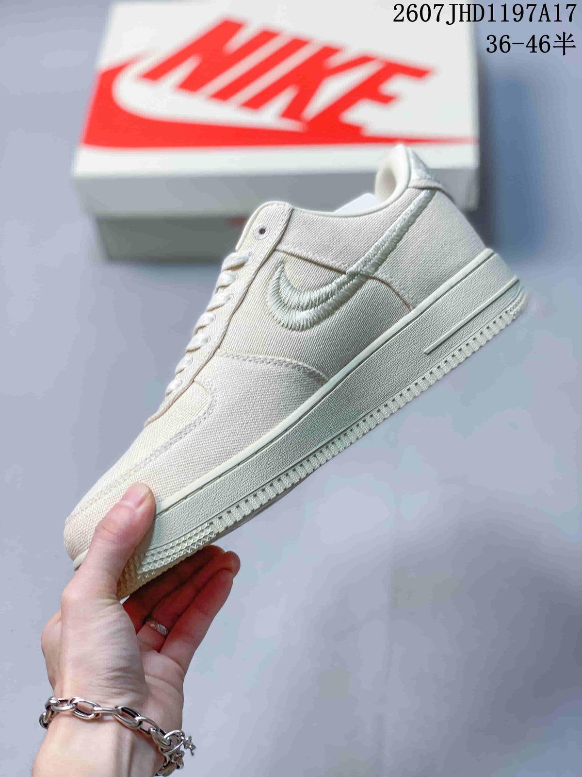 Stussy x Nike Air Force 1 '07 Cream Woven Trainers - product image from the listing.