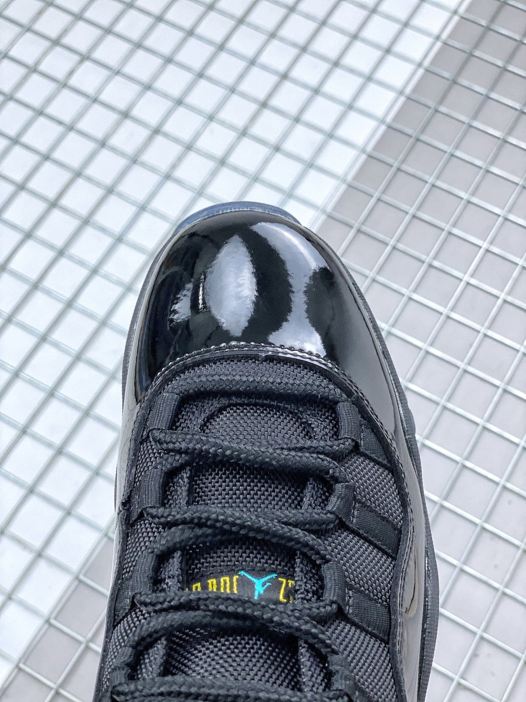 Air Jordan 11 Retro Gamma Black Sneakers 378037-006 - product image from the listing.