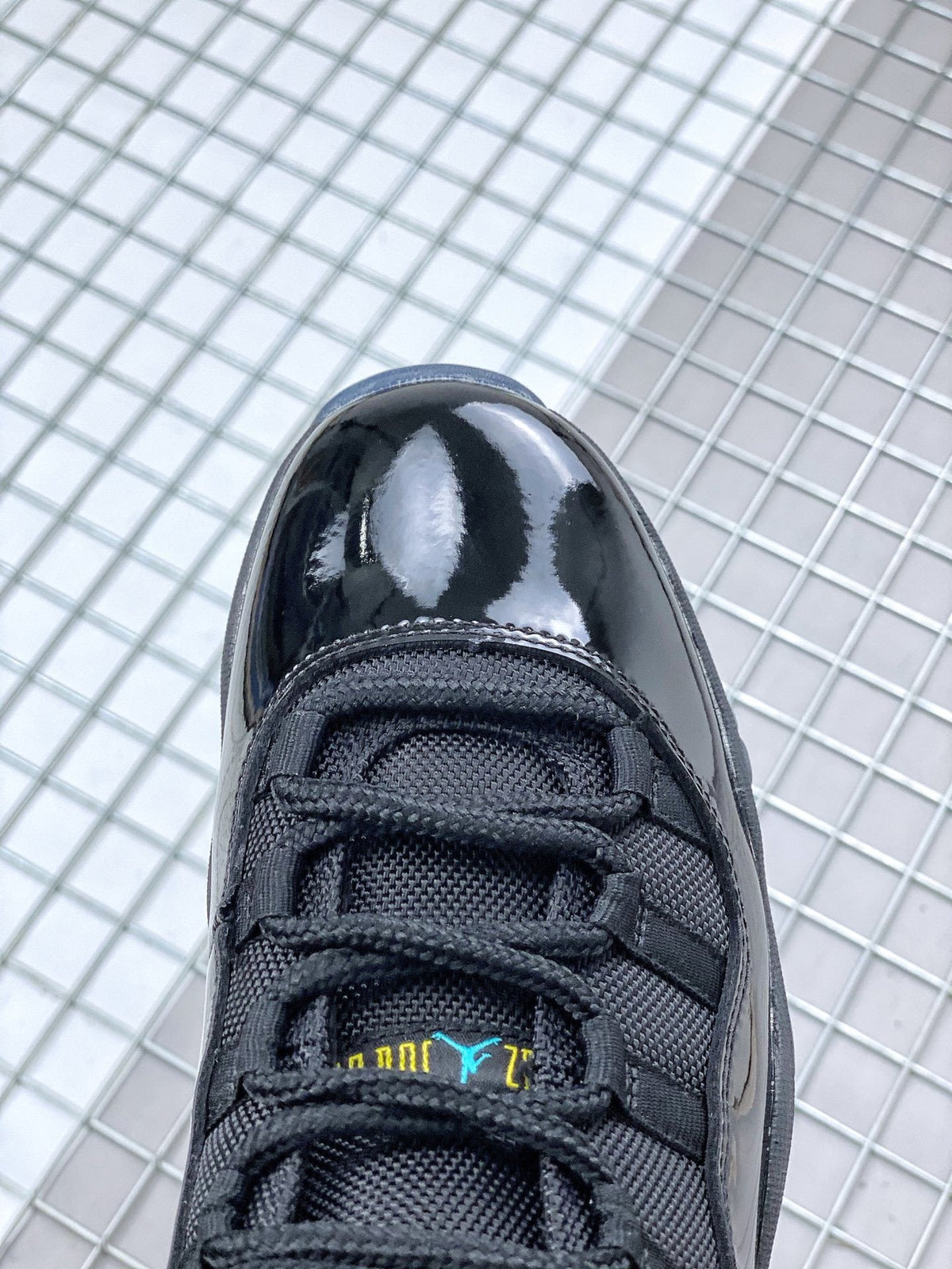 Air Jordan 11 Retro Gamma Black Sneakers 378037-006 - product image from the listing.