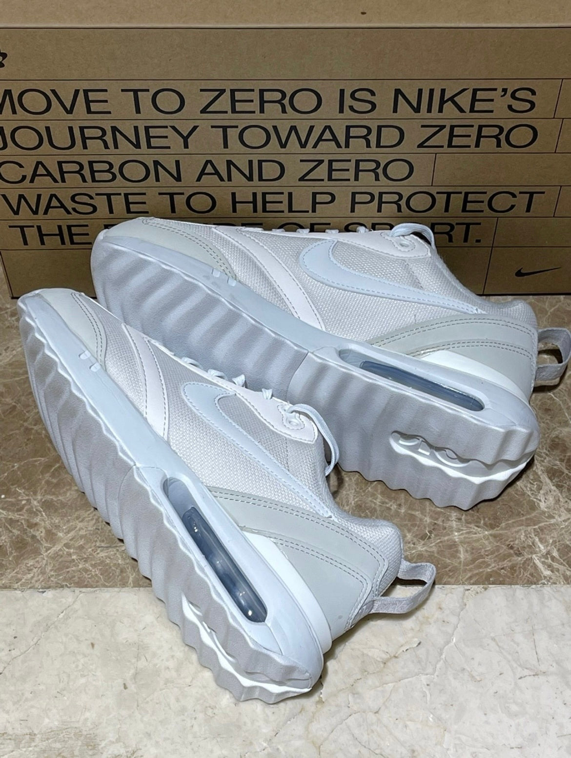 Grey Nike Air Max Dawn DM8261-001 Sneakers - product image from the listing.