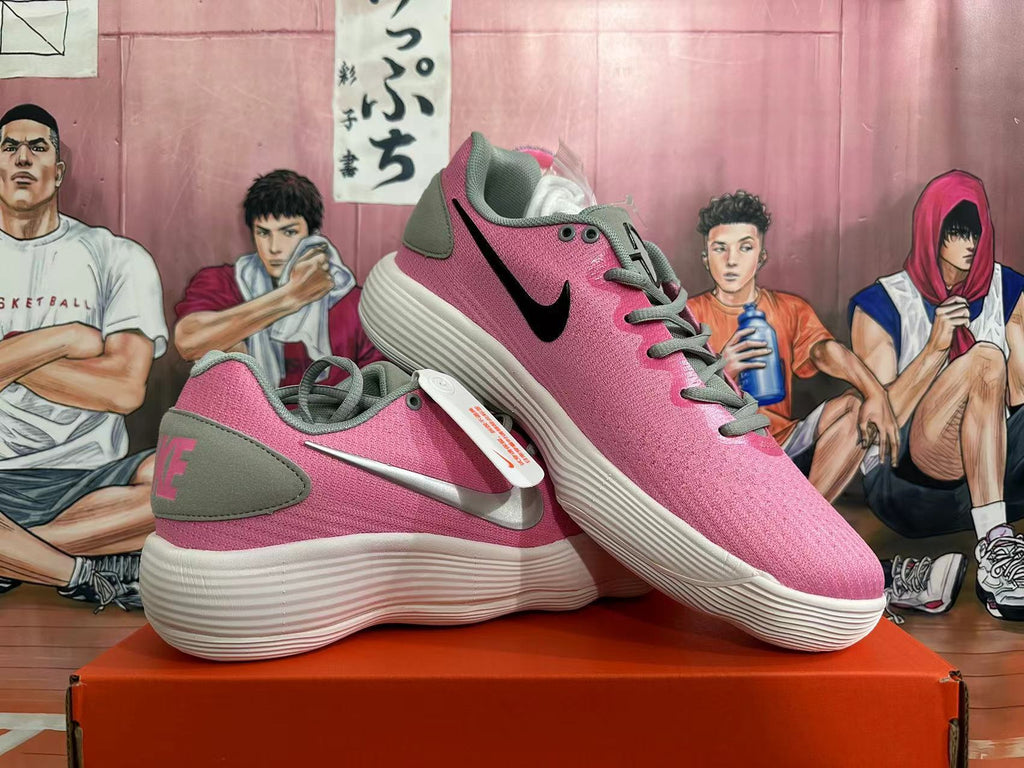 Nike Low-Top Sneakers in Pink and Grey - product image from the listing.