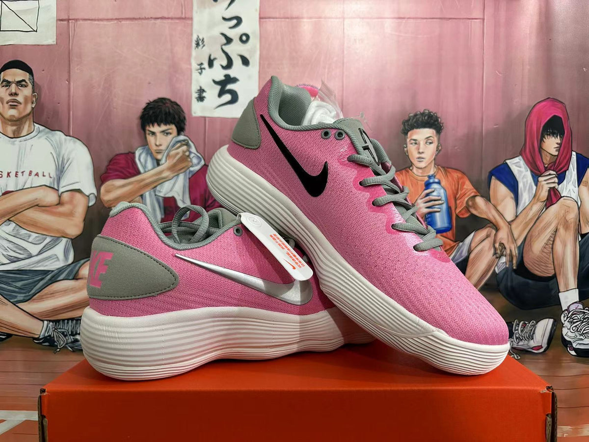 Nike Low-Top Sneakers in Pink and Grey - product image from the listing.