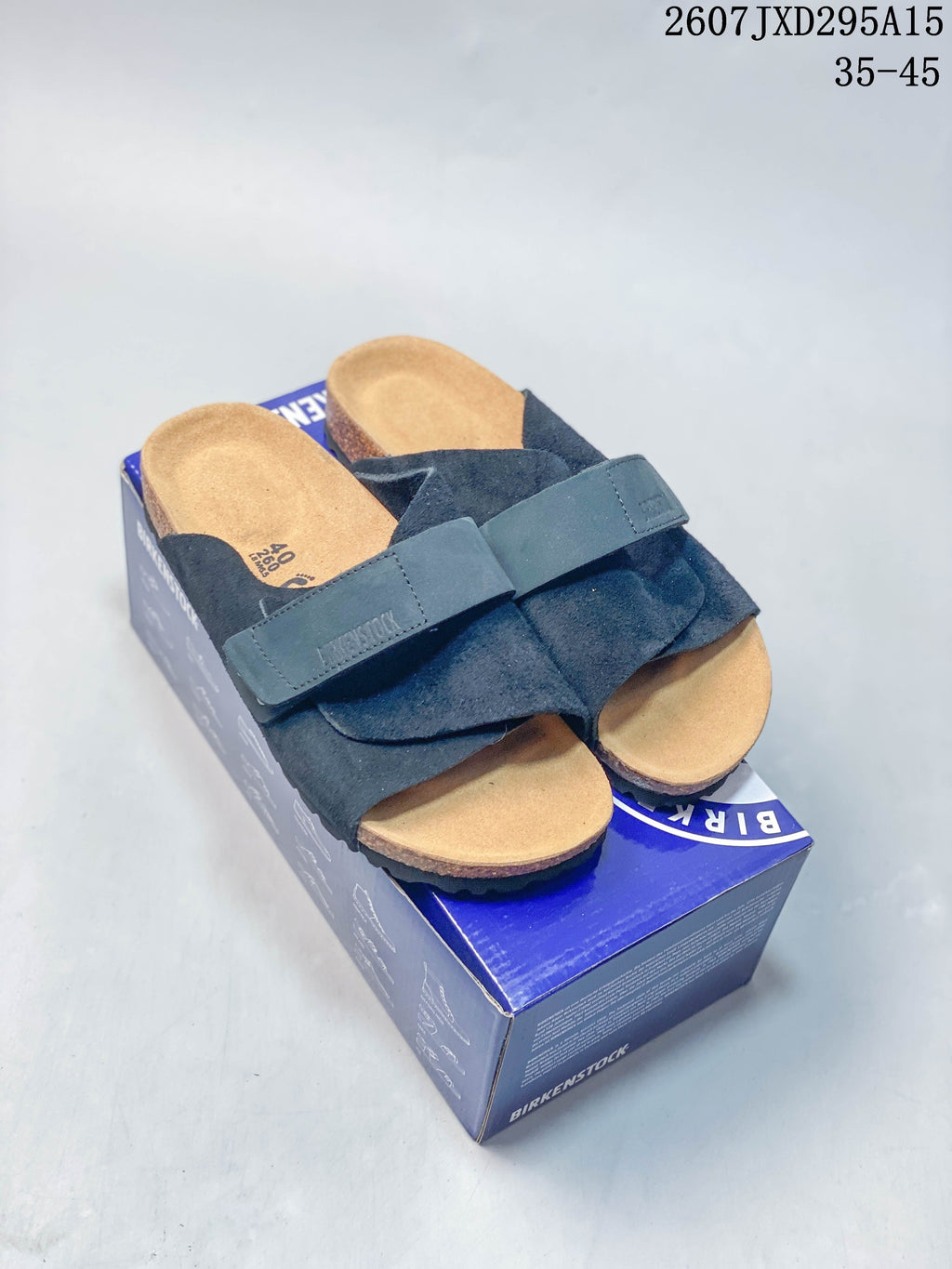 Birkenstock Boston Suede Shearling Crossover Sandals in Black - product image from the listing.